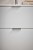 uchwyt edge stal inox 100 mm na białym froncie