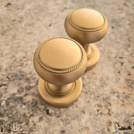 gałko klamka KR617 mosiężna z perłą MSL