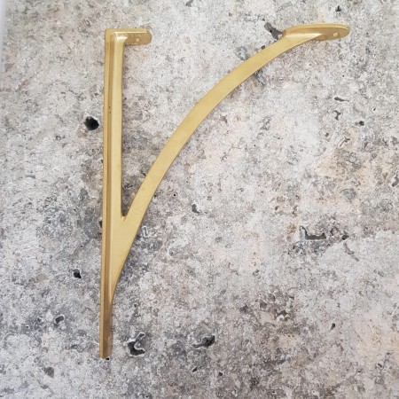 mosiężna podpórka do półki